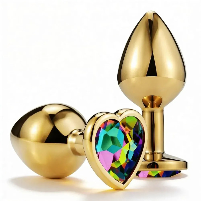 Анальная пробка ALUME, S, металлическая золотистая с разноцветным камнем в форме сердца.